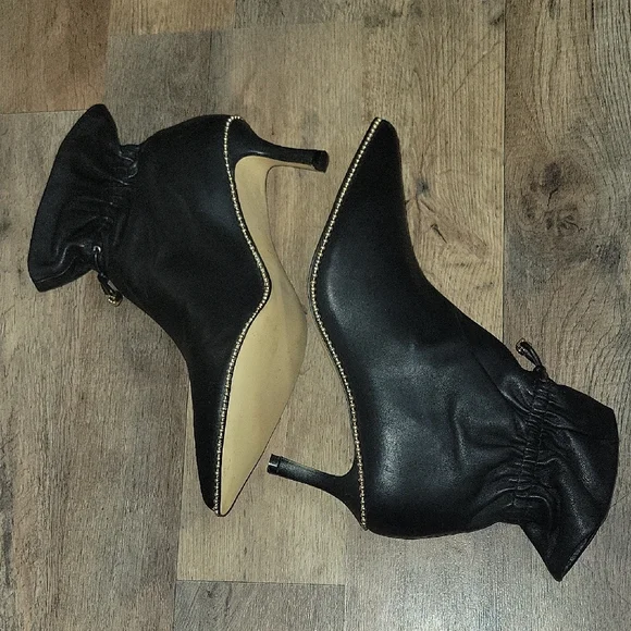 Coach Black Heeled Boots with Gold Trim - Picture 7 of 8